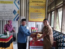 Kementerian Sosial Melalui Dinas Sosial Kuansing, Camat Pangean Serahkan Bantuan Sosial Kepada Orang Lanjut Usia (Lansia)