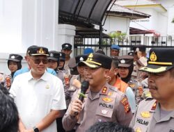 Polres Kuansing Kawal Aksi Damai Aliansi Anak Kuansing (ALIANG) Bersatu di Kejari Teluk Kuantan