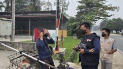 KARANG TARUNA DESA PETAI BAGIKAN MASKER GRATIS UNTUK WARGA TERDAMPAK KABUT ASAP